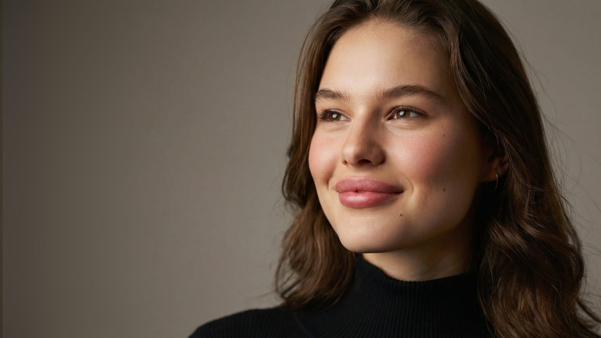 Woman in cozy sweater representing healthy weight loss journey